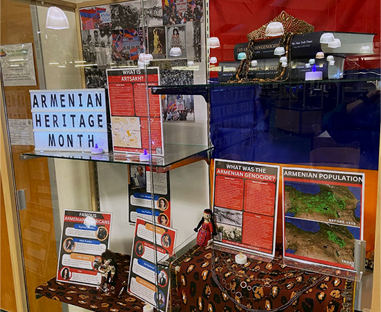 Library display case installation for Armenian Heritage Month created by teen volunteers.